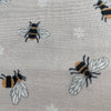 Expertly designed by Lewis and Irene, this Bee Fabric features adorable chubby bees in a soft pale blue or cream colour palette. Made with high-quality quilters cotton, this fabric is perfect for creating charming and whimsical projects. Add a touch of nature and sweetness to your sewing projects with this delightful fabric, fabric by the meter, bee fabric, buy fabric with bees on, bee designs,